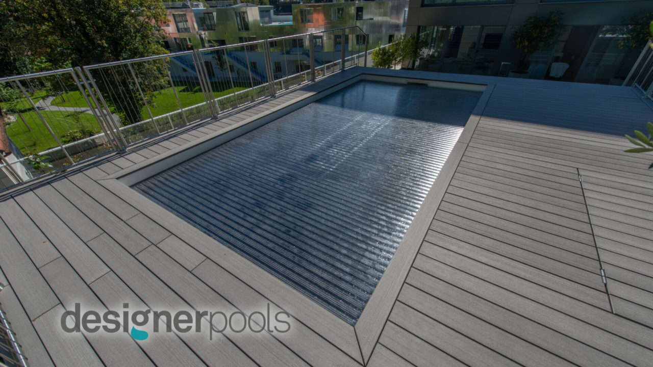 Flachskimmerpool mit Rollladenabdeckung - designerpools